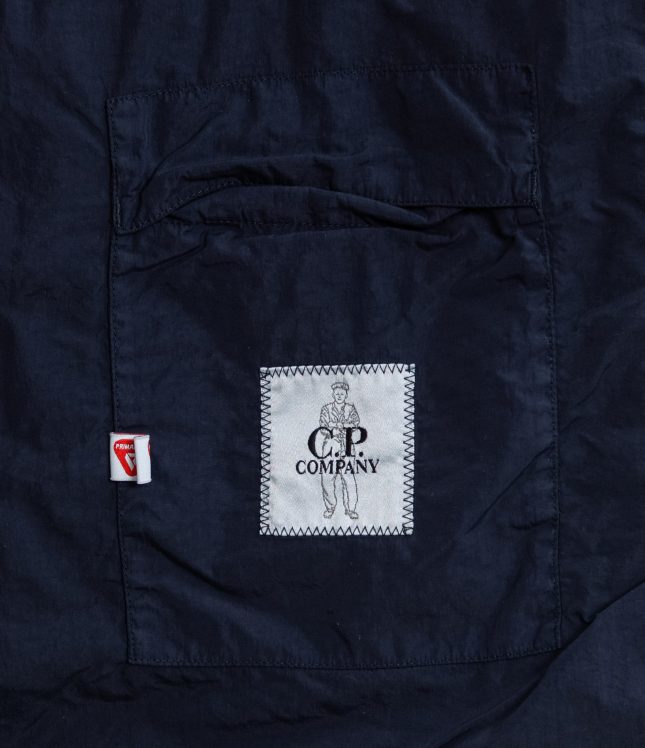 Чоловіча куртка C.P. COMPANY FLATT NYLON MEDIUM JACKET WITH PRIMALOFT®-TC CMOW066A 005991G COL:888, колір синій | Ціна 19999 грн, фото 9