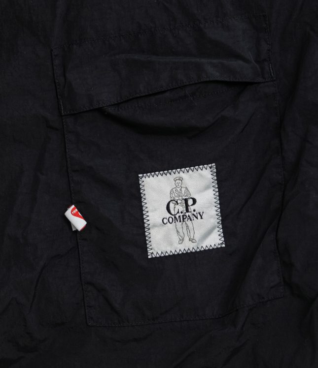 Чоловіча куртка C.P. COMPANY FLATT NYLON MEDIUM JACKET WITH PRIMALOFT®-TC CMOW066A 005991G COL:999, колір чорний | Ціна 20499 грн, фото 9