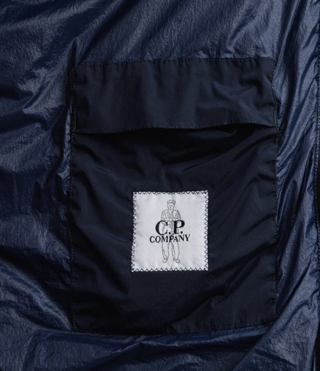 Чоловіча куртка C.P. COMPANY NYCRA-R GARMENT DYEING DOWN JACKET CMOW254A 005864G COL:888, колір синій | Ціна 30999 грн, фото 9